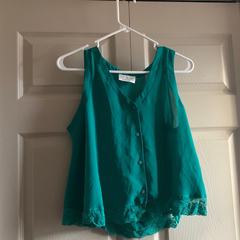 Woman’s medium turquoise sheer tank top.
